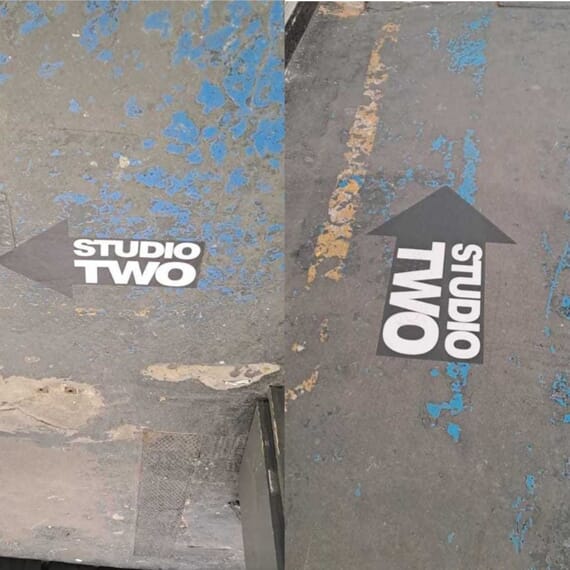 An image of the studio two interior wayfinding floor graphics.